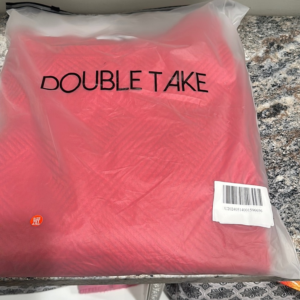 Red short set. Size 2XL. Brand new with tags.